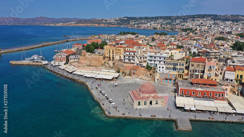 Aerial drone panoramic view of iconic and picturesque Venetian old port of Chania with famous landmark lighthouse and traditional character, Crete island, Greece © aerial-drone