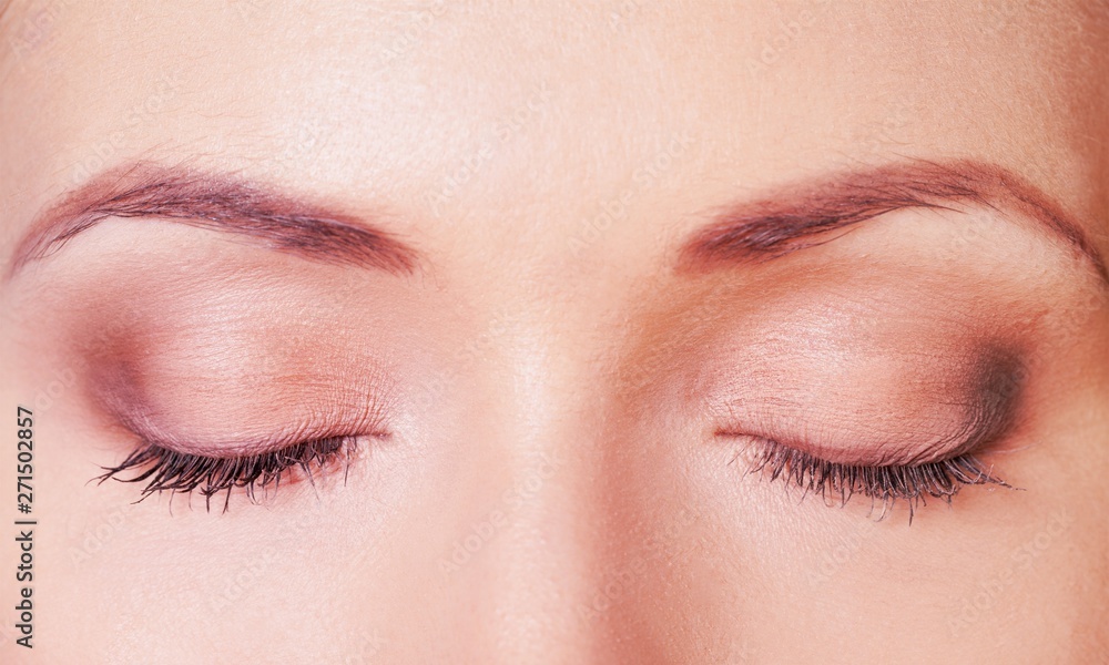 Naklejka premium Close-up of a Woman with Eyes Closed