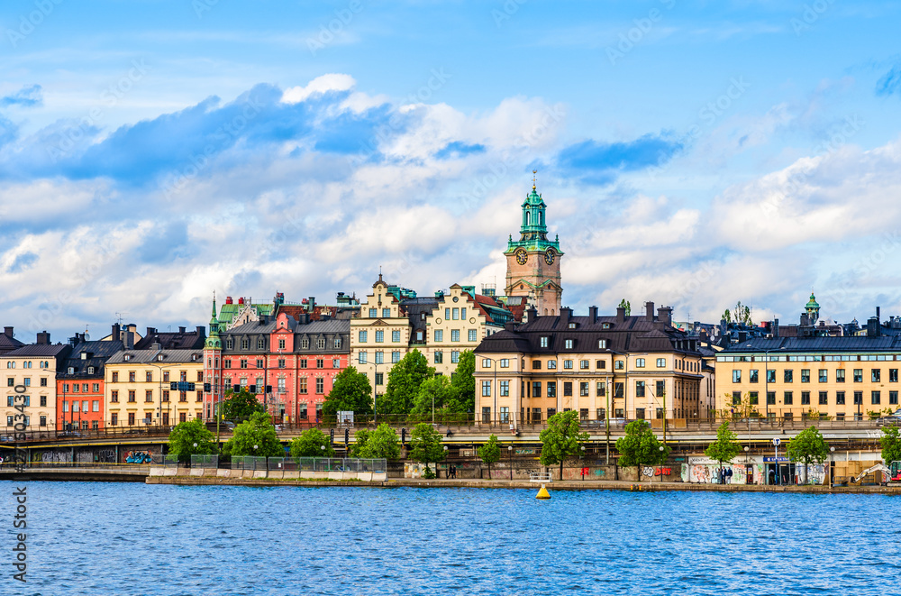 Urban landscape  of colorful houses from the old town of Gamla Stan on Lake Malaren Riddarfjarden waterfront in Stockholm, Sweden