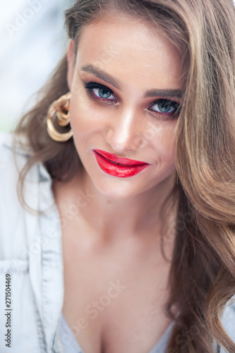 Beautiful Woman With Beauty Makeup On Face Red Lipstick On Lips And Glamourous Look