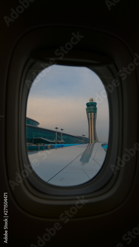 Control Tower at the Airport from the Plane Window