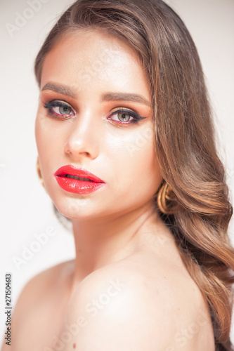 Beauty Makeup. Woman With Beautiful Face And Pink Lips. Close Up Of Beautiful Young Elegant Female Model With Glamorous Sexy Makeup, Soft Smooth Skin And Plump Full Pink Lips. High Quality Image. 