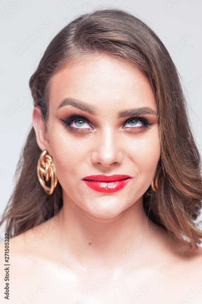 Eyelashes Makeup. Woman Beauty Face With Black Lashes Extensions and Red Lips Eyelashes Makeup. Woman Beauty Face With Black Lashes Extensions and Red Lips