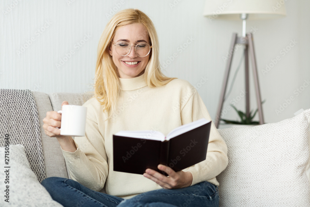 Woman Reading Book And Drinking Tea At Home Woman Reading Book And Drinking Tea At Home