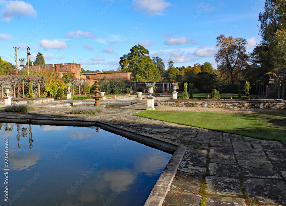 A hexagonal pond and formal gardens at Arley Arboretum in the Midlands in England.