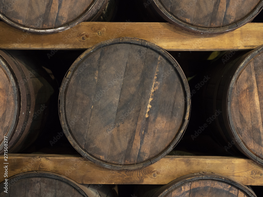 Old rum/whiskey barrels stored away while maturing