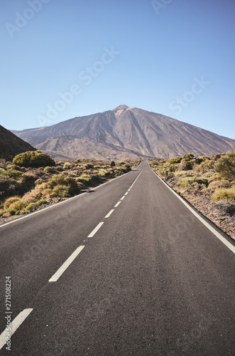 Scenic road with Mount Teide in background, color toning applied, Teide National Park, Tenerife, Spain.