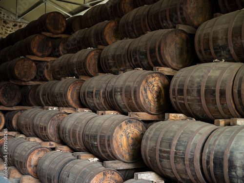 Old rum/whiskey barrels stored away while maturing