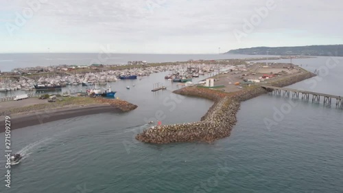 Spectacular views of Kachemak bay and the busy Homer Alaska boat harbor on the spit.