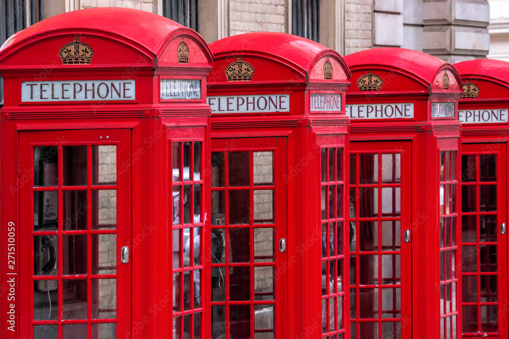 Famous red telephone booths in Covent Garden street, London, England Famous red telephone booths in Covent Garden street, London, England