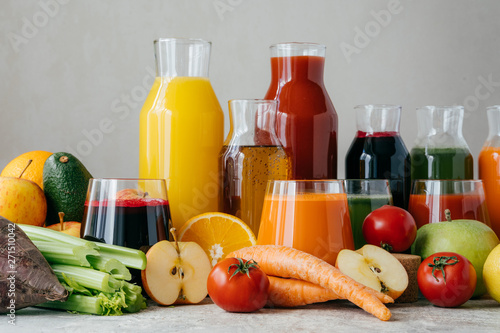 Healthy fresh juice made of healthy ingredients. Fruit and vegetables on table, isolated over white background. Eating, food and detox concept. Homemade drink