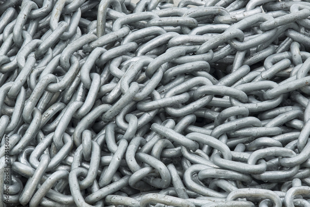 many chain links create an industrial background many chain links create an industrial background