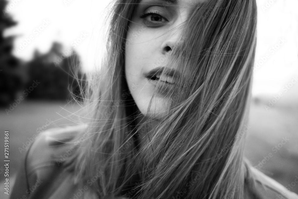 Sensual portraits of a young girl.Black and white.Close up.Hair develops in the wind Sensual portraits of a young girl.Black and white.Close up.Hair develops in the wind