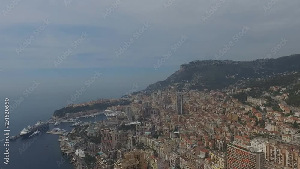 Aerial view of stadium of Monaco at sunrise, view from La Turbie, landmark of Monaco, Monte-Carlo, port Cap Dail, port Fontvieille, Monaco Ville, blue sea, morning Aerial view of stadium of Monaco at sunrise, view from La Turbie, landmark of Monaco, Monte-Carlo, port Cap Dail, port Fontvieille, Monaco Ville, blue sea, morning
