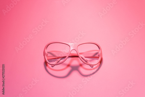 trendy style sunglasses on pink background. fashion minimal concept