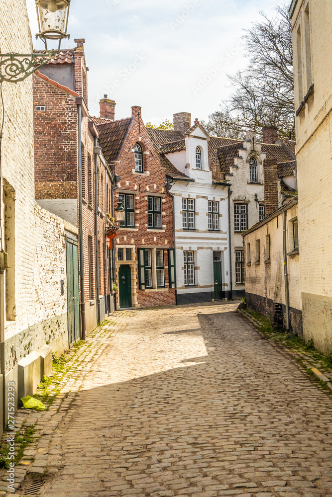 Bruges, Belgium - APRIL 05, 2019: Streets of the medieval city of Bruges