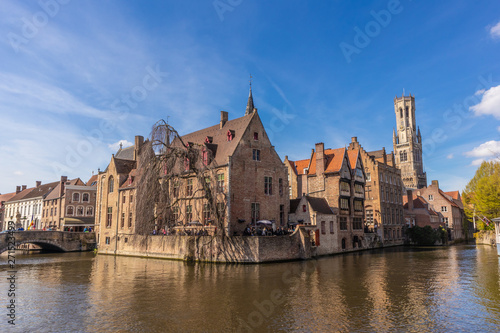 Bruges  Belgium - APRIL 05  2019  Historic medieval buildings and canal in the old town of Bruges