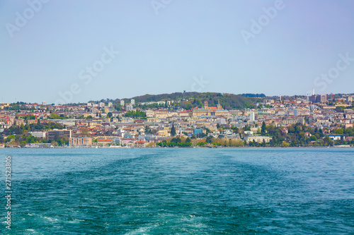 Fototapeta Naklejka Na Ścianę i Meble -  Panorama of Lausanne city taken from boat on Geneva Lake