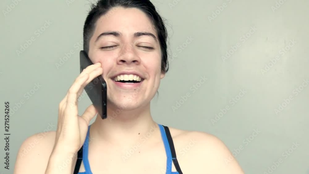 Eve On Phone Happy Good News Excited Smiling Woman white hispanic brown hair Eve On Phone Happy Good News Excited Smiling Woman white hispanic brown hair