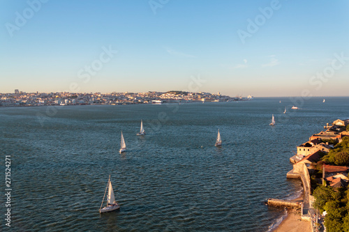 Aerial view of Lisbon and South bay with sailboats on river Tagus