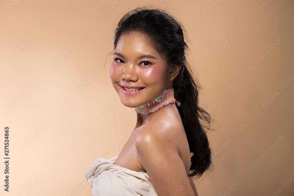 Fashion Young thin Asian Woman Tan skin eyes black hair beautiful