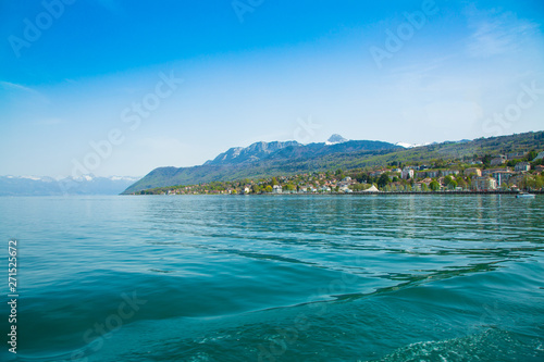 Fototapeta Naklejka Na Ścianę i Meble -  View from ferry boat of Lake Geneva and Evian-les-Bains city in France