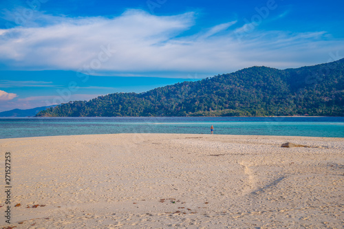 Clear water and blue sky at the paradise island in the tropical sea of Thailand