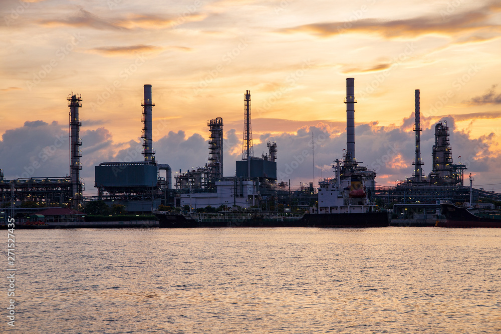 Petroleum oil refinery factory over sunrise in the morning, Bangkok, Thailand