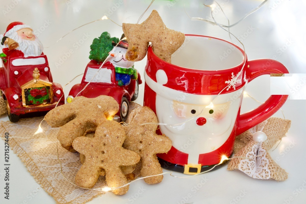 Tasty ginger man cookies with red cup