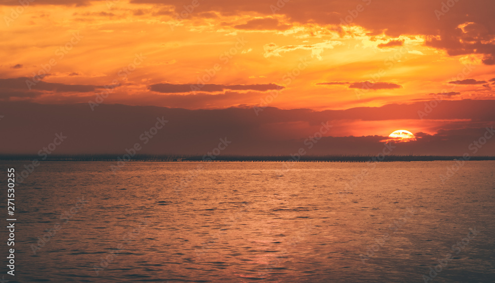 Beautiful panoramic view of  ocean tranquil at sunset,Two boats are stationary.copy space For text.
