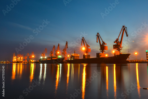 Night  cranes at harbour docks are busy working