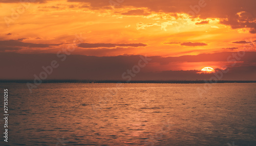 Beautiful panoramic view of  ocean tranquil at sunset,Two boats are stationary.copy space For text. © Thasist