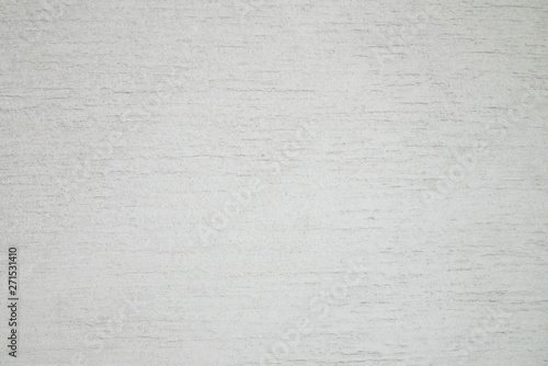 ライトグレーのハケの塗り跡のある壁、背景素材