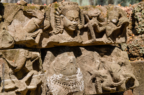 Apsara Closeup Detail of Ta Prohm Temple is The One Attractive Temple In Angkor Thom Area at Siem Reap Province, Cambodia. photo