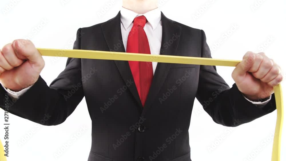 Red tie business person stretch yellow rubber band 4K Red tie business person stretch yellow rubber band 4K