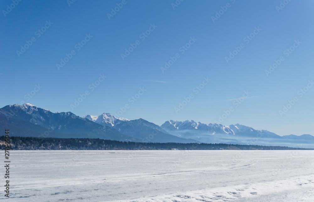 INVERMERE, CANADA - MARCH 21, 2019: town on the Windermere Lake early spring landscape.