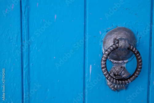 Unusual door decoration on the doors of Chefchaouen, Morocco, the blue city © Marylou