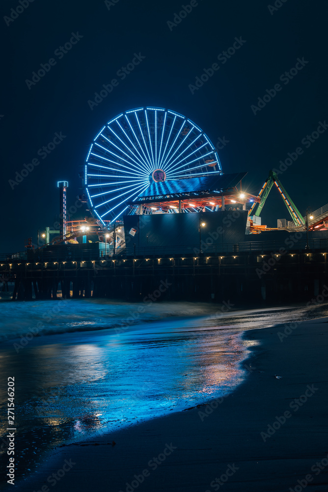 Ferris wheel on the Santa Monica Pier at night, in Santa Monica, Los Angeles, California