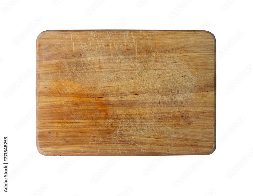 Old wooden cutting board with scratches on white background.