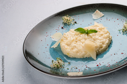 Risotto with parmesan cheese. traditional Italian dish. On white background