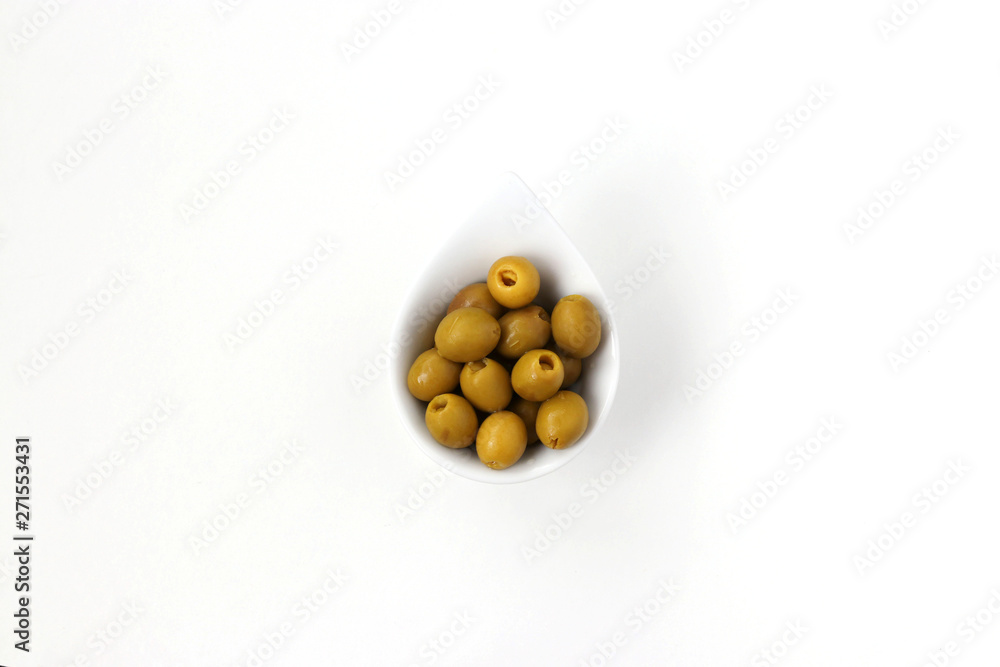 Olives without pits in a white plate isolated on white background, horizontal photo Olives without pits in a white plate isolated on white background, horizontal photo