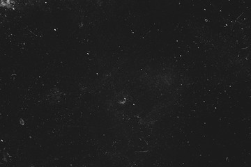Dust and scratches design. Black abstract background. Vintage effect. Copy space.