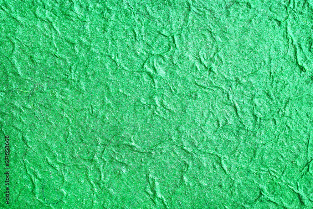 Colorful bright green mulberry paper patterns texture abstract top view for background Colorful bright green mulberry paper patterns texture abstract top view for background