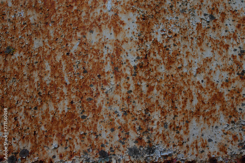 old rusty wall with white paint