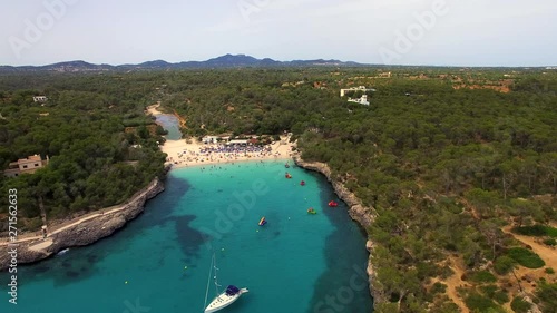 AERIAL - Drone shot flying towards Cala Mondrago beach on Mallorca - SPAIN JUL2016.mov photo