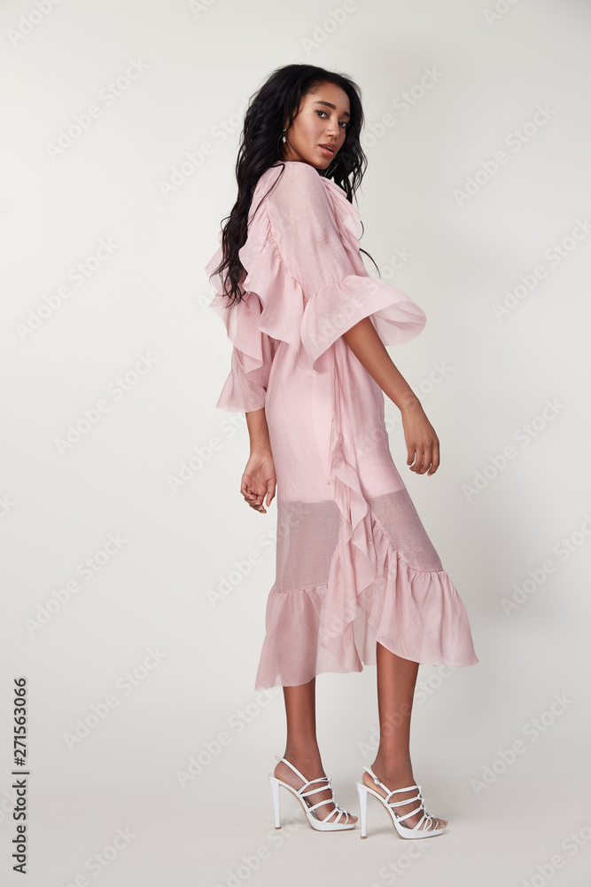 Pretty beautiful sexy elegance woman skin tan body fashion model glamor pose wear trend dress casual clothes party summer collection makeup hair style brunette success accessory jewelry studio.