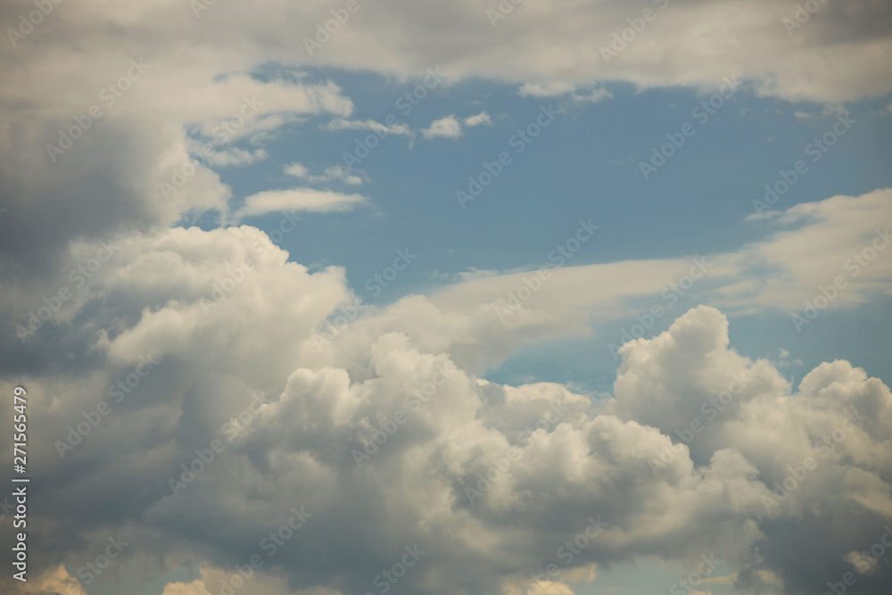 Clear blue sky with cumulus and cirrus clouds. Sunny weather. Joyful mood. High pressure. Clean air ecology. Water in a gaseous state. The source of rain and hail. Weather prediction Clear blue sky with cumulus and cirrus clouds. Sunny weather. Joyful mood. High pressure. Clean air ecology. Water in a gaseous state. The source of rain and hail. Weather prediction