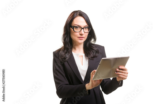 Portrait of business woman in eyeglasses holding tablet computer