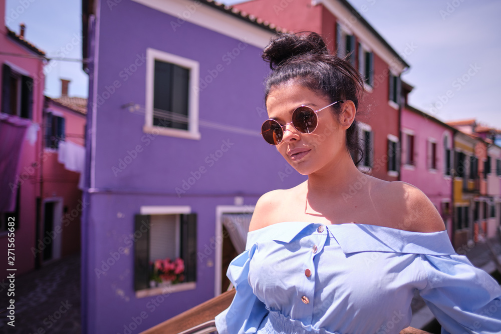 Fototapeta premium Young tourist woman walks in the old town. Italy.