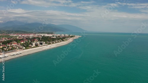 Wallpaper Mural Aerial video shooting. Panoramic view of Imeretinsky resort. black sea in Sochi. Clean and comfortable beach.  Recreation area. Caucasus mountain. The view from the top. Tourist season. Luxury hotel. Torontodigital.ca